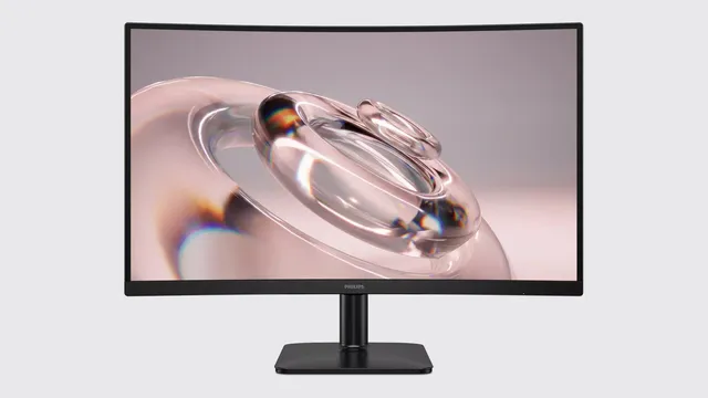 Monitor Philips curvo de moldura preta, visto de frente, com uma imagem abstrata em tons rosados no ecrã e pé central de base retangular