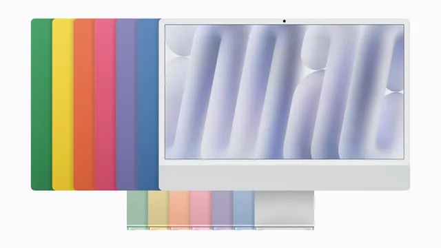 iMac prateado de frente, com as traseiras das versões verde, amarela, laranja, rosa, roxa e azul alinhadas atrás